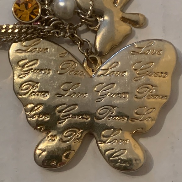 Women’s Gold Color Guess Love Necklace with Butterfly Pendant - Picture 8 of 10